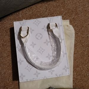 Small crossbody or hand held bag